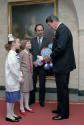 C34019-23, President Reagan receiving a gift while greeting Yekaterina Lycheva, a fifth grade S…