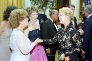 C7984-26, Nancy Reagan and Mrs. Joao Baptista de Oliveira Figueiredo greeting Debbie Reynolds d…