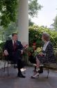 C41801-15, President Reagan and Prime Minister Thatcher of the United Kingdom talk on the patio…