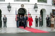 C50479-2, President Reagan and Nancy Reagan at the Diplomatic Entrance awaiting the arrival of …