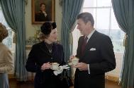 C881-32, President Reagan and Prime Minister Margaret Thatcher of the United Kingdom talking in…