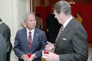 C21123-15, President Reagan talking with Prime Minister of Thailand Prem Tinsulanonda during a …