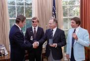 C04282-10a President Reagan meeting to present the crew of the Double Eagle II, Maxie Anderson,…