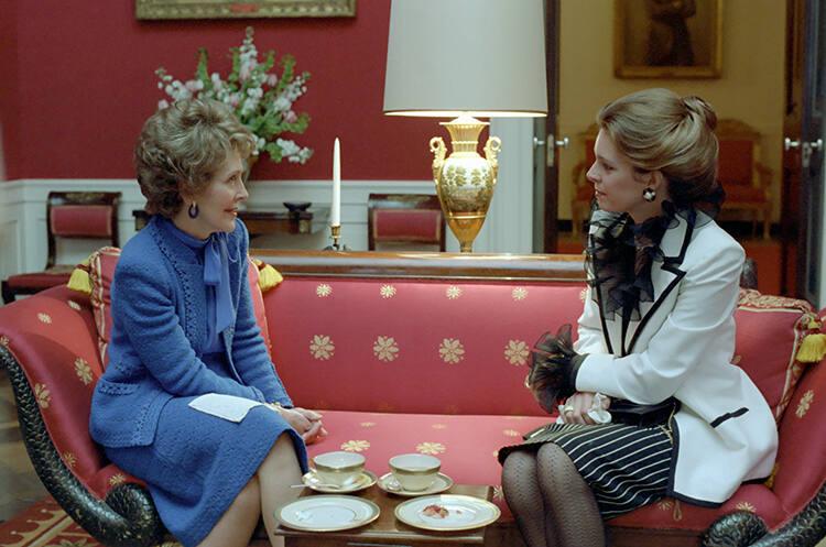 C6879-11, Nancy Reagan having Tea with Queen Noor of Jordan in the Red Room. 03/16/1982.  Reaga…