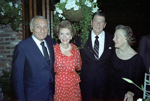 C3595-28A, President Reagan and Nancy Reagan posing with Henri Salvatori and Grace Salvatori at…