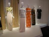 L to R: yellow and white Galanos evening gown. white beaded Galanos evening ensemble, orange ch…