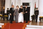 C4886-10A , President Reagan and Nancy Reagan greet King Hussein I and Queen Noor of Jordan for…