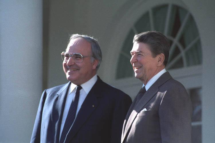 C26055-17  President Reagan and Chancellor Helmut Kohl of the Federal Republic of Germany greet…